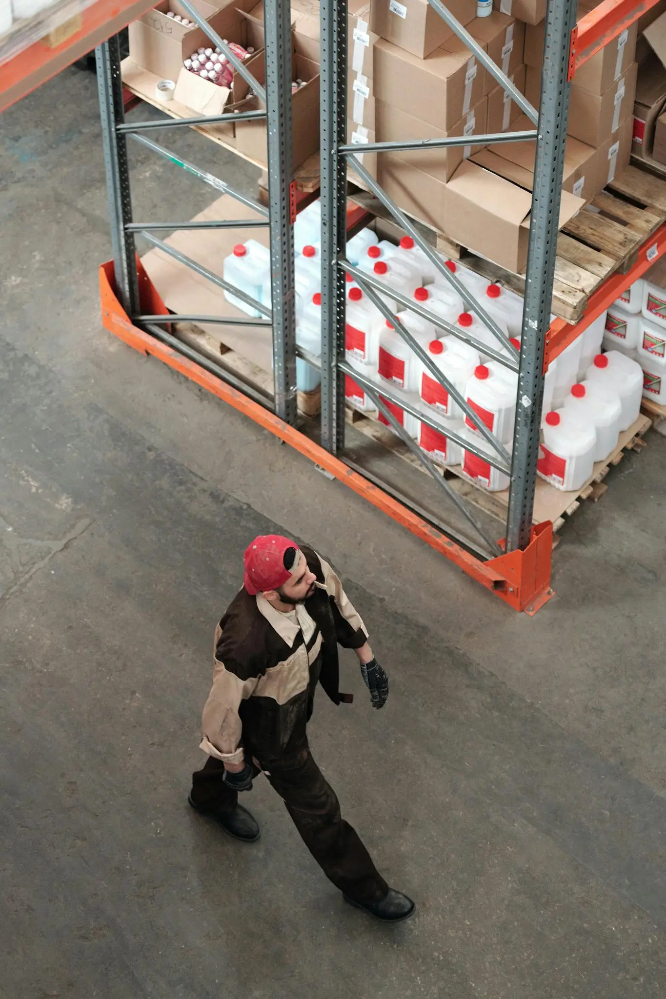 Warehouse aisle showing logistics operations in motion.